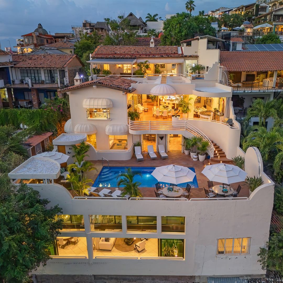 Casa Tabachin lit up at night